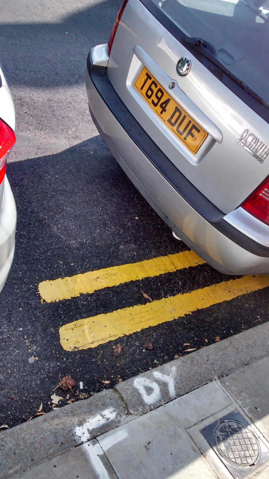 Penalty Charge Notice for parking on double yellows no T bar Off