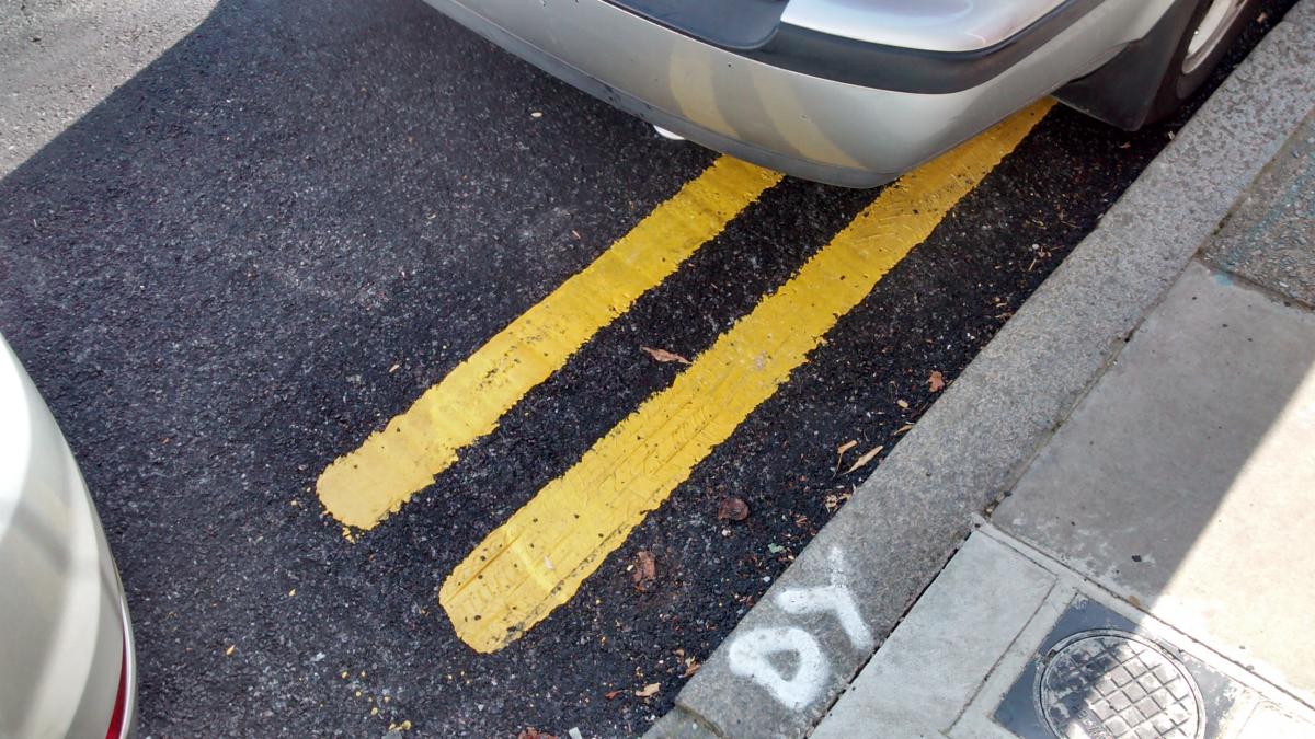 Penalty Charge Notice for parking on double yellows no T bar Off