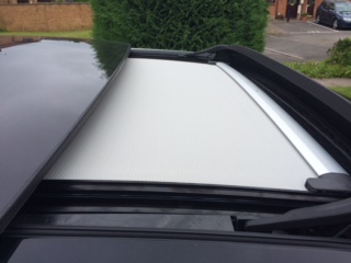 Leaves etc on sunblind of panoramic roof