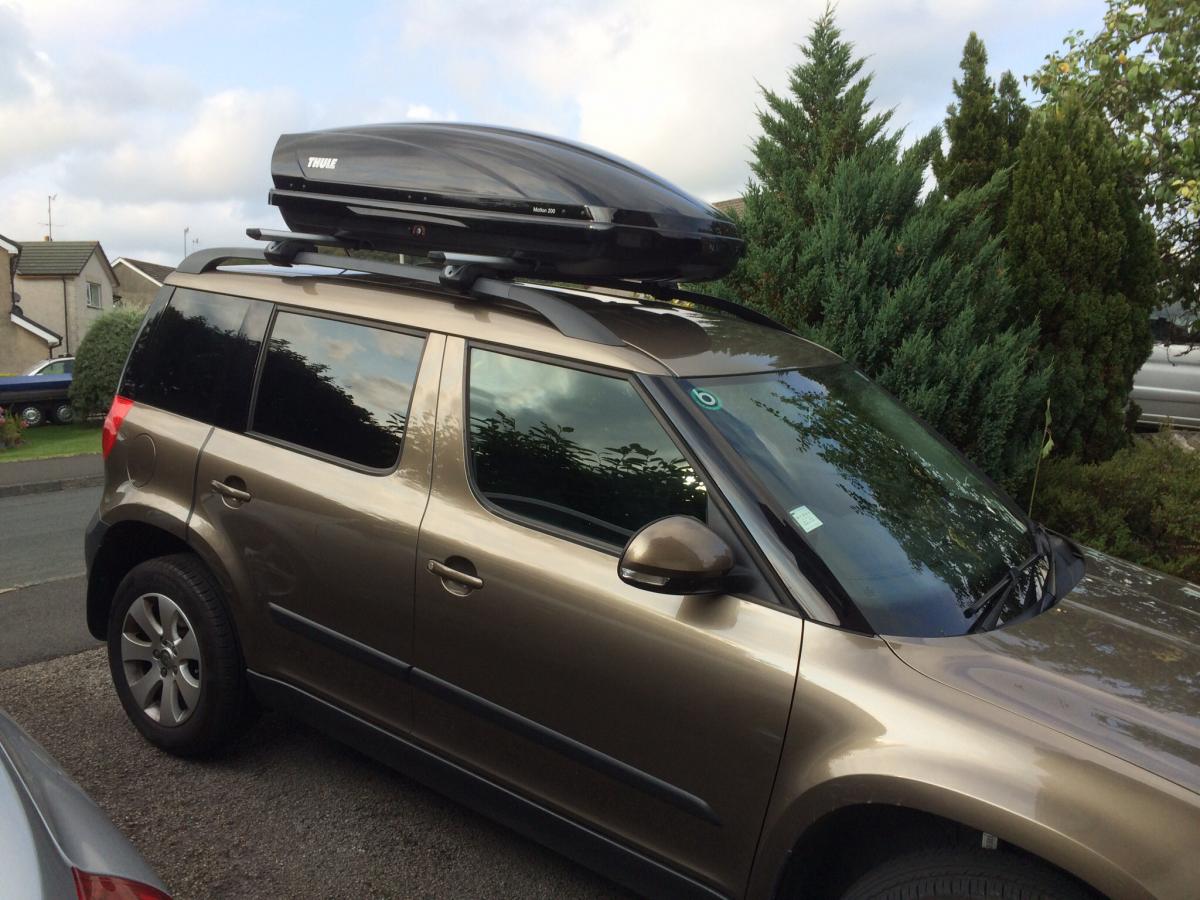 Reaching into/loading a Roof Box on a Yeti