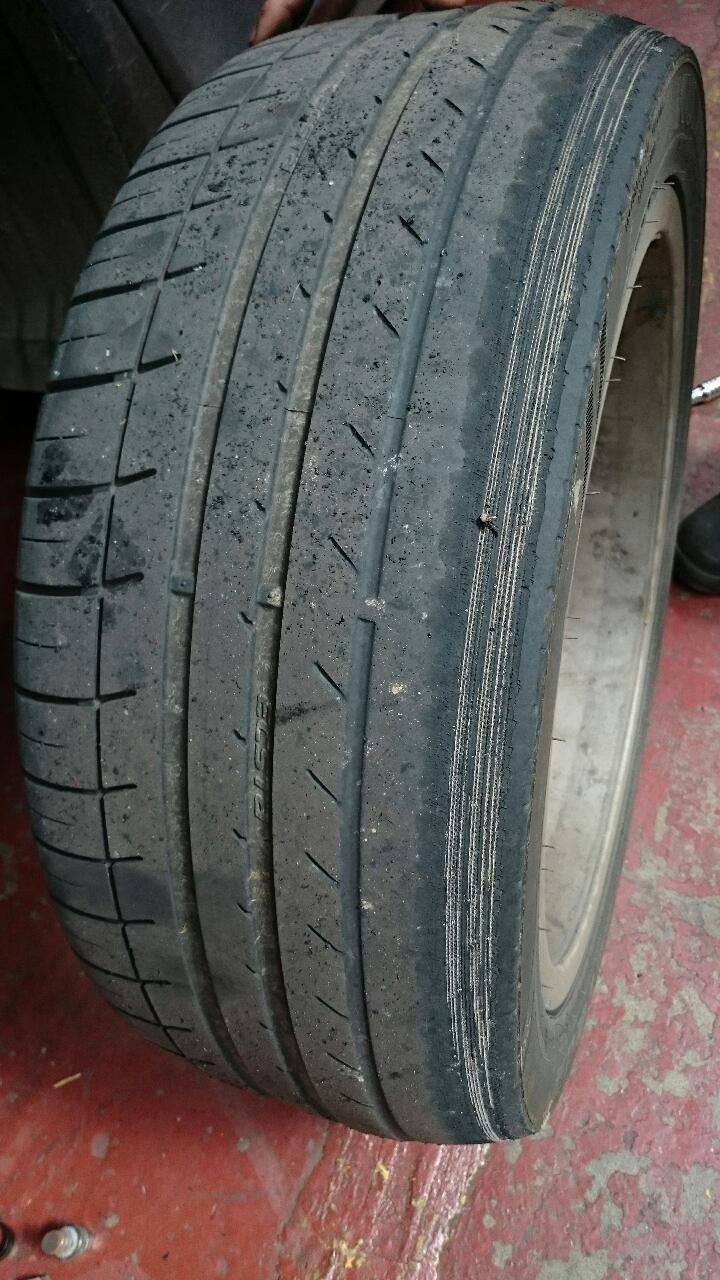 Rear tires scrubbing out