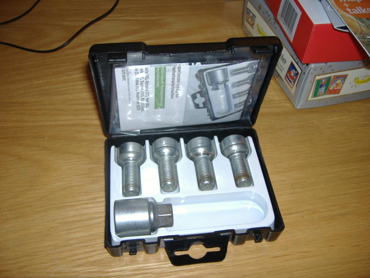 Genuine VAG Skoda locking wheel nuts, fitted to car for under a week