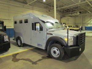 Armored-Escort-Vehicle-300x225.jpg.bba9ea8387773c40baa242074eedf426.jpg