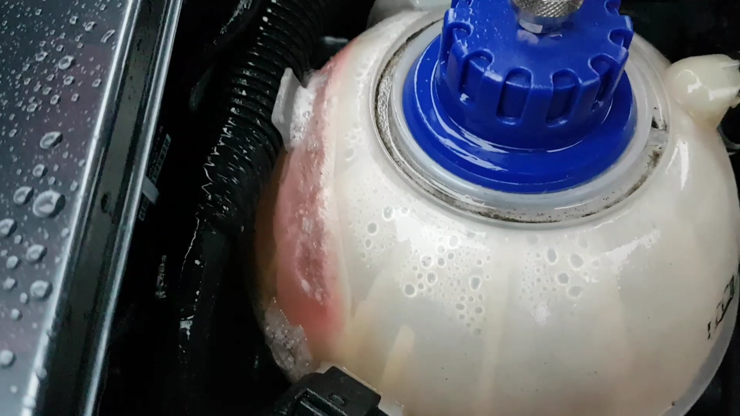 Coolant tank leaking. But what caused it?