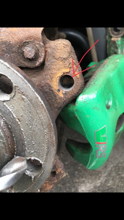 Vrs calliper with freshly drilled hole ready for tapping.jpg