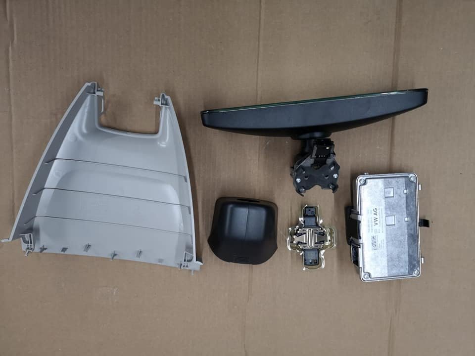 What is the difference between these rear view mirrors? Skoda Karoq