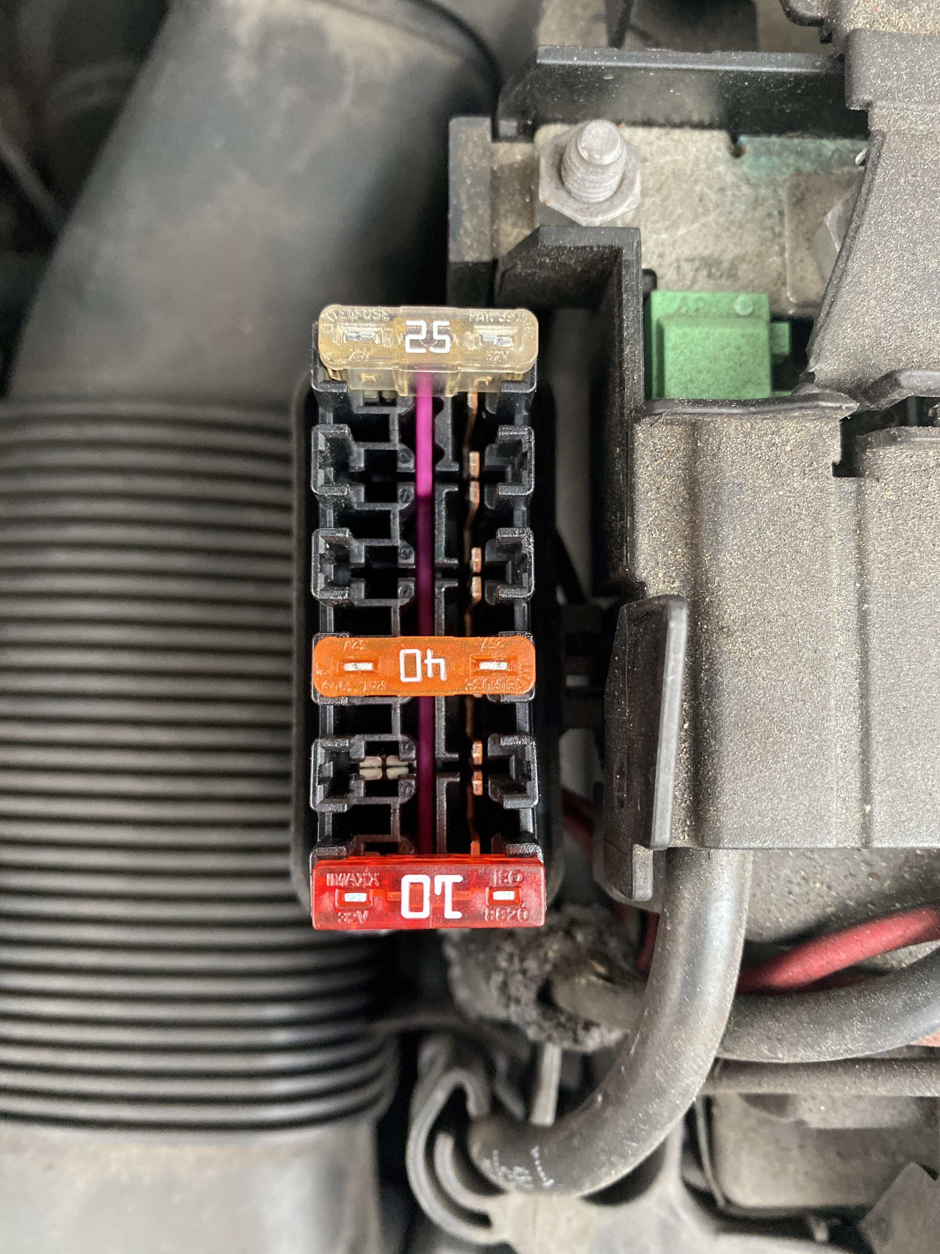 Fuse box at battery
