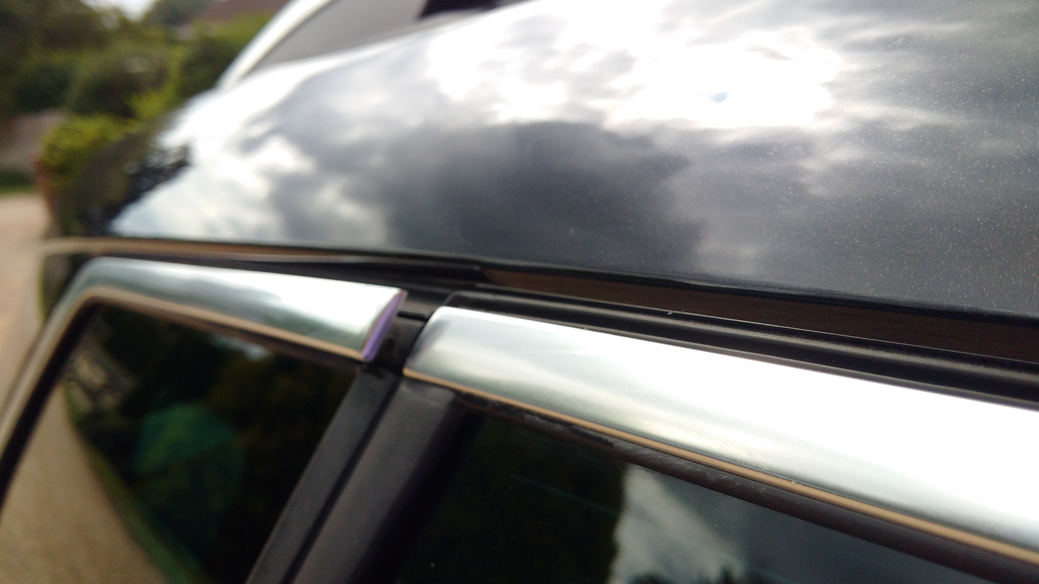 Chrome trim peeling on drivers side rear fixed window Skoda Karoq