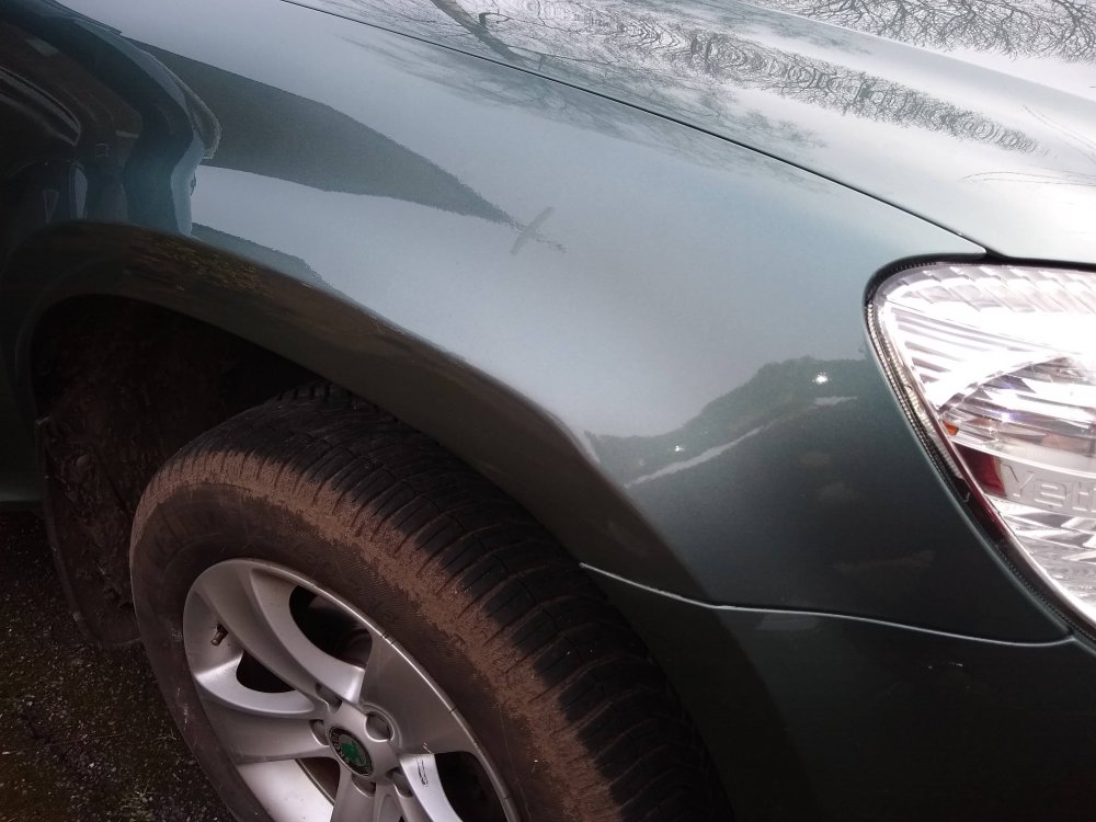 Wheel arch repaired.jpg