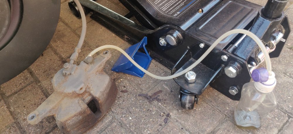 20250430 01 Bleed hose on old caliper.jpg