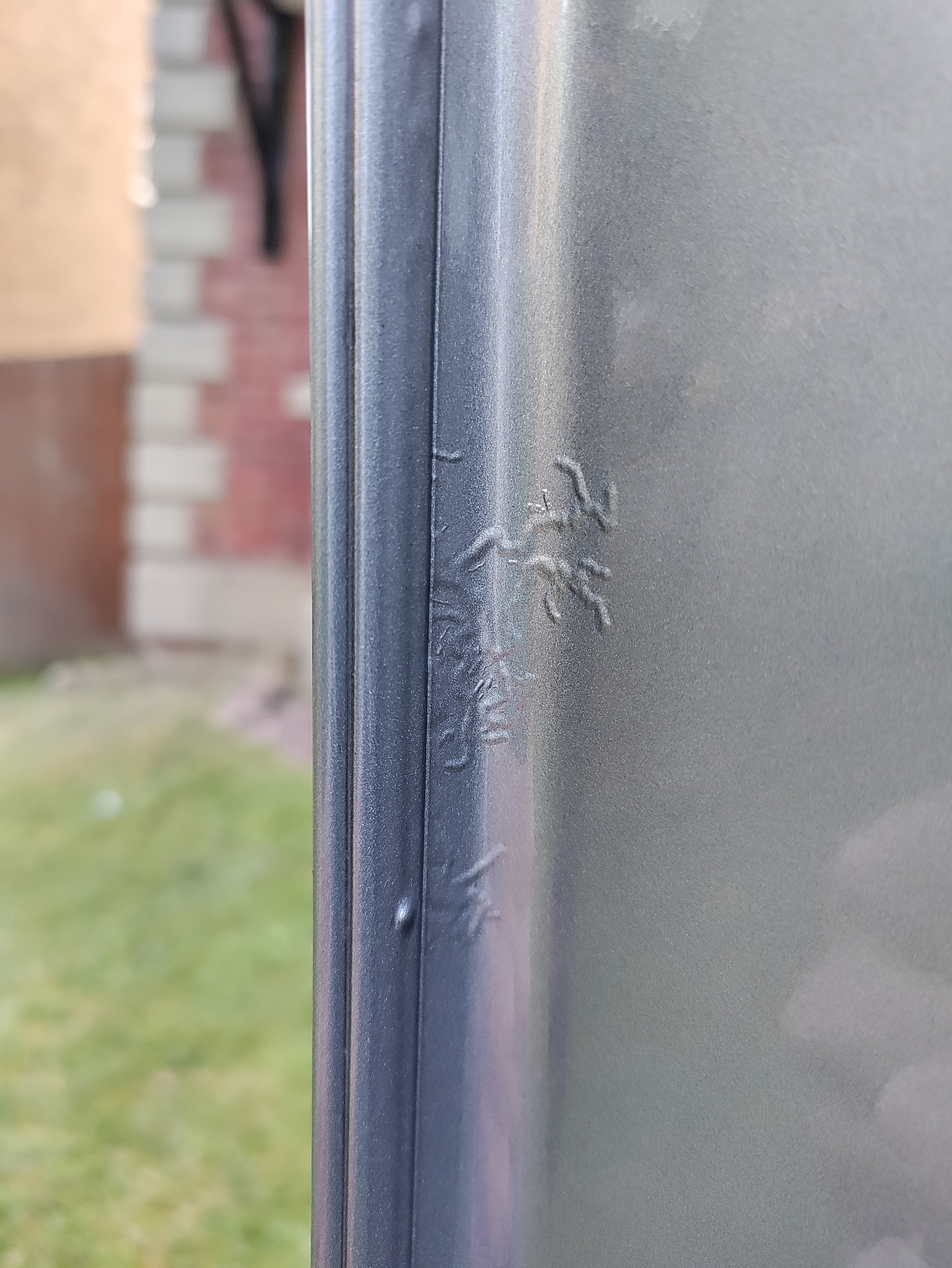 Advice Please. Strange wavy paint lines on inside surface of passenger door