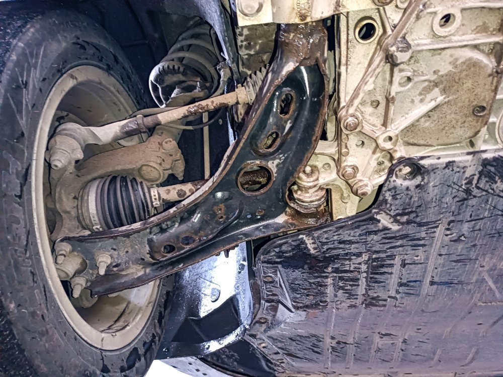 2012 Octavia Front L Sheet Metal Wishbone.jpg