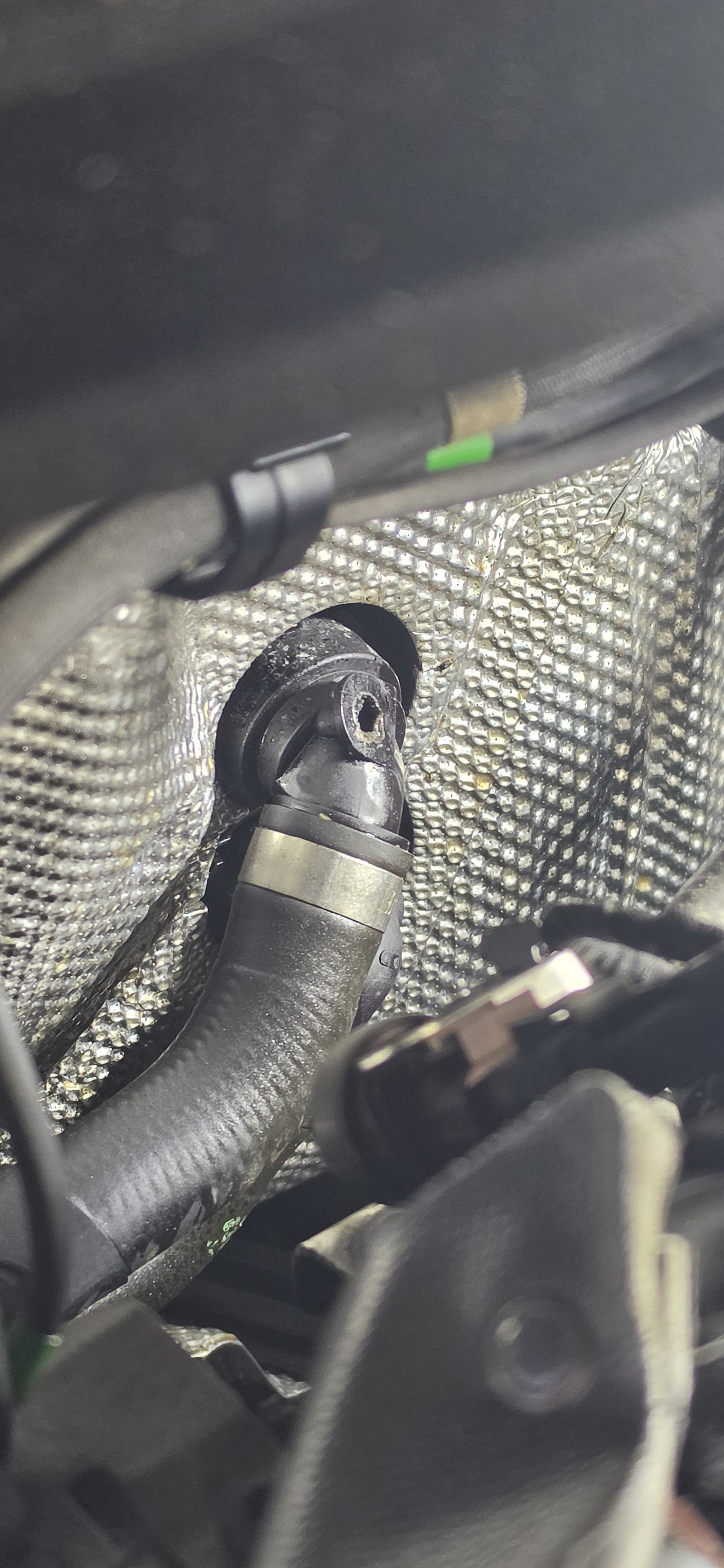 Broken heater pipe connector leaking coolant, part number?